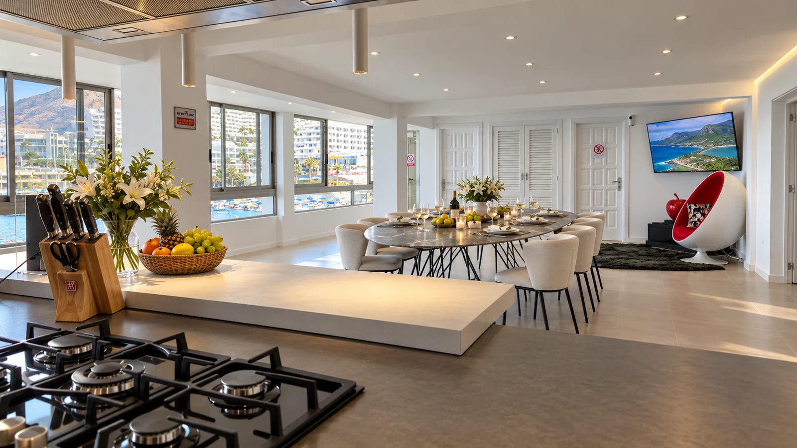 Second kitchen with gas hob beside the lower-level dining area at Villa White Octopus